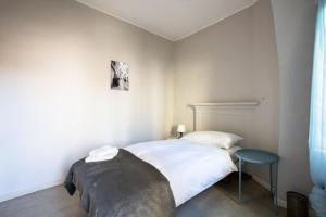 Letto o letti in una camera di Osteria Pozzo