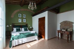 A bed or beds in a room at Agriturismo Le Biricoccole