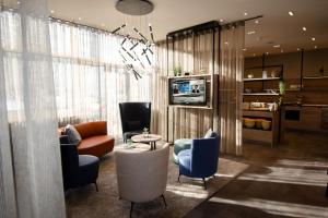 Kuchyň nebo kuchyňský kout v ubytování Hotel Morjan