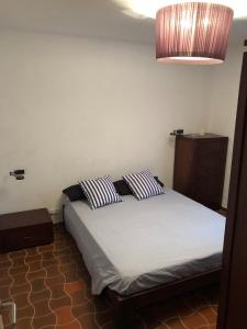 Tempat tidur dalam kamar di Binisafua Playa - Apartamento 24