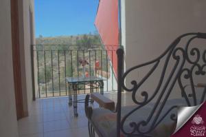 A balcony or terrace at Casa Corazon de Plata Suites