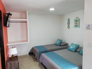 Posada Smith Town客房内的一张或多张床位