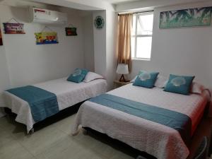 Posada Smith Town客房内的一张或多张床位