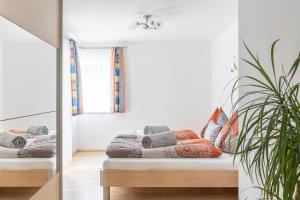 Postel nebo postele na pokoji v ubytování Appartement Taurachblick