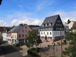 an aerial view of a town with buildings at LandhotelUllrich in Baumholder