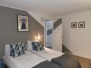 Postel nebo postele na pokoji v ubytování B&B Bovenweg