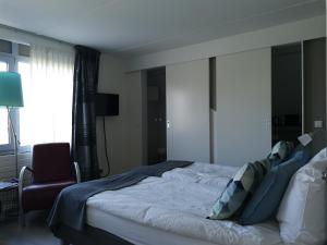 Postel nebo postele na pokoji v ubytování B&B Bovenweg