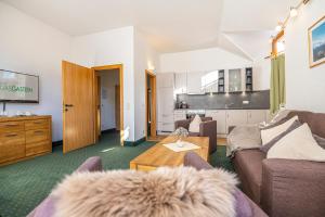 Posezení v ubytování Hotel Das Gastein - ganzjährig inklusive Alpentherme Gastein & Sommersaison inklusive Gasteiner Bergbahnen