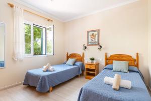 Postel nebo postele na pokoji v ubytování Villa Gabriel Son Parc by Villa Plus + 23 fotografií