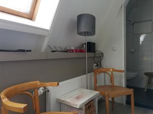 Kuchyň nebo kuchyňský kout v ubytování B&B Bovenweg