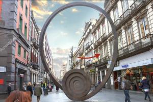 a large metal sculpture in the middle of a street at Urban Suites in Las Palmas de Gran Canaria