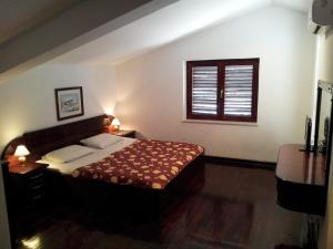 Postel nebo postele na pokoji v ubytování Villa Sara Guesthouse