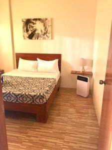 Postel nebo postele na pokoji v ubytování Acapulco Resort