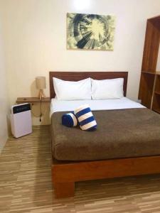 Cama ou camas em um quarto em Acapulco Resort
