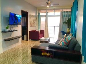 TV a/nebo společenská místnost v ubytování Acapulco Resort