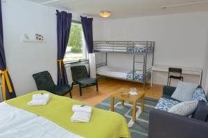 Postel nebo postele na pokoji v ubytování Österlengården