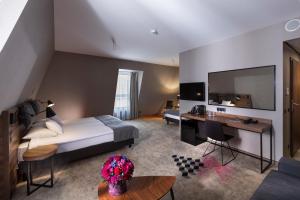 Postel nebo postele na pokoji v ubytování Hotel Sadova