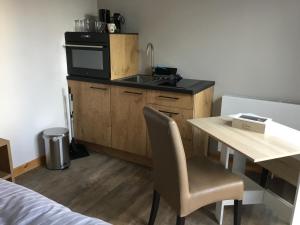 Kuchyň nebo kuchyňský kout v ubytování Slaperij Salud! Studios & appartementen