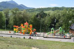 a park with a bunch of playground equipment at MyMara , Apartmán Ivadella in Bešeňová