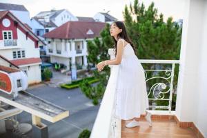 Balkón nebo terasa v ubytování Khách sạn Đoàn Vượng Đà Lạt
