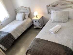 Posteľ alebo postele v izbe v ubytovaní APARTAMENTO VACACIONAL - RELAX