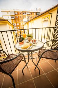 Ein Balkon oder eine Terrasse in der Unterkunft Hotel Arunda II