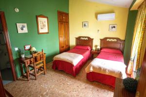 Ein Bett oder Betten in einem Zimmer der Unterkunft Hotel Arunda II