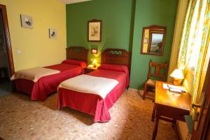 Ein Bett oder Betten in einem Zimmer der Unterkunft Hotel Arunda II