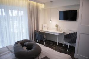 Telewizja i/lub zestaw kina domowego w obiekcie Mały Sopot Boutique