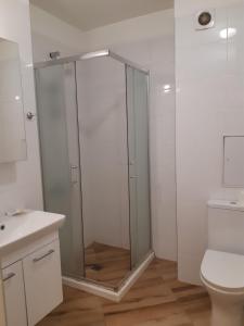 A bathroom at Huge Apartment with a parking space in the same building