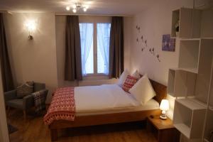 Postel nebo postele na pokoji v ubytování Hotel Schweizerhof
