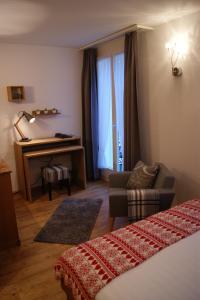 Postel nebo postele na pokoji v ubytování Hotel Schweizerhof