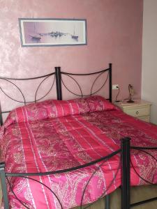 Postel nebo postele na pokoji v ubytování B&B Colti Di Rosa