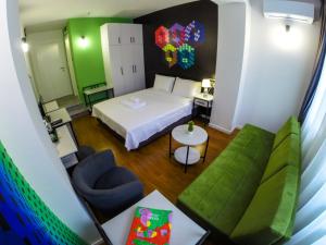 Postel nebo postele na pokoji v ubytování Osten Art Hotel