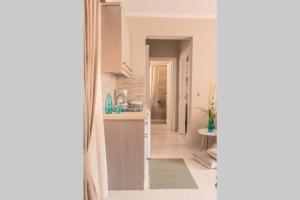 Kuchyň nebo kuchyňský kout v ubytování Remvi Deluxe Apartment 202 with Sea View