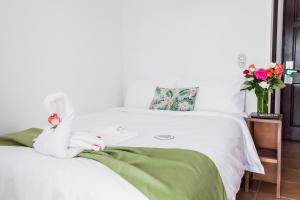 Cama o camas de una habitación en The Palms At Coco Beach
