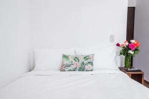 Cama o camas de una habitación en The Palms At Coco Beach