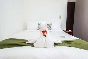 Cama o camas de una habitación en The Palms At Coco Beach