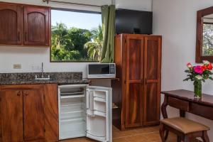 Una cocina o zona de cocina en The Palms At Coco Beach