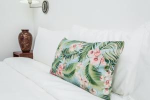 Cama o camas de una habitación en The Palms At Coco Beach