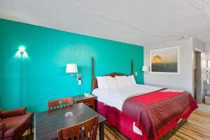 Säng eller sängar i ett rum på Hotel O Columbia Downtown near I-65
