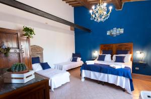 A bed or beds in a room at Agriturismo Le Biricoccole