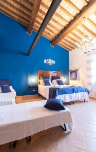 A bed or beds in a room at Agriturismo Le Biricoccole