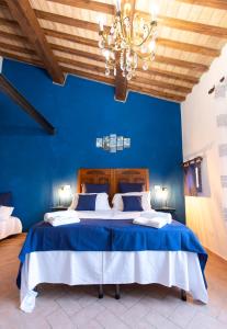 A bed or beds in a room at Agriturismo Le Biricoccole