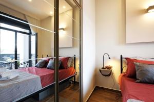Кровать или кровати в номере Central SPA Galaxy Apartment