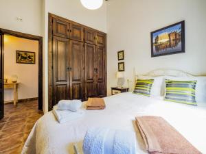Posteľ alebo postele v izbe v ubytovaní Cubo's Villa Ruiz