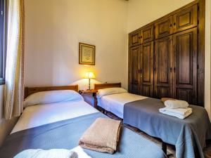 Posteľ alebo postele v izbe v ubytovaní Cubo's Villa Ruiz + 37 fotografií