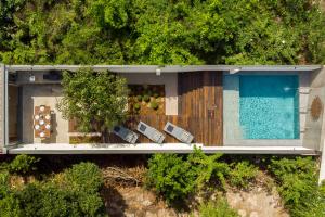 an aerial view of a house with a swimming pool at Villa Almada - Amazing City Centre Villa with Private Pool in Porto