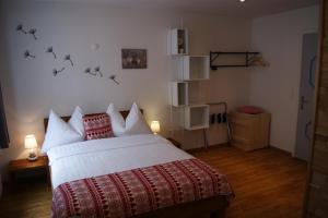 Postel nebo postele na pokoji v ubytování Hotel Schweizerhof
