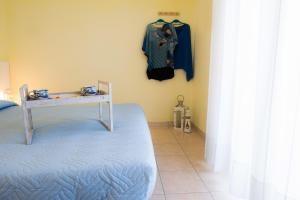 Postel nebo postele na pokoji v ubytování Le Petit Hotel